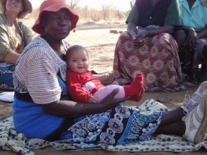 Woman holding toddler